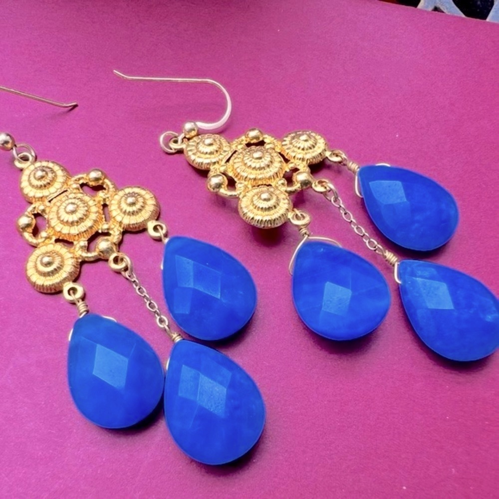 Faceted blue stones, 18KT gold plated chandelier tear drop earrings. Exotic.